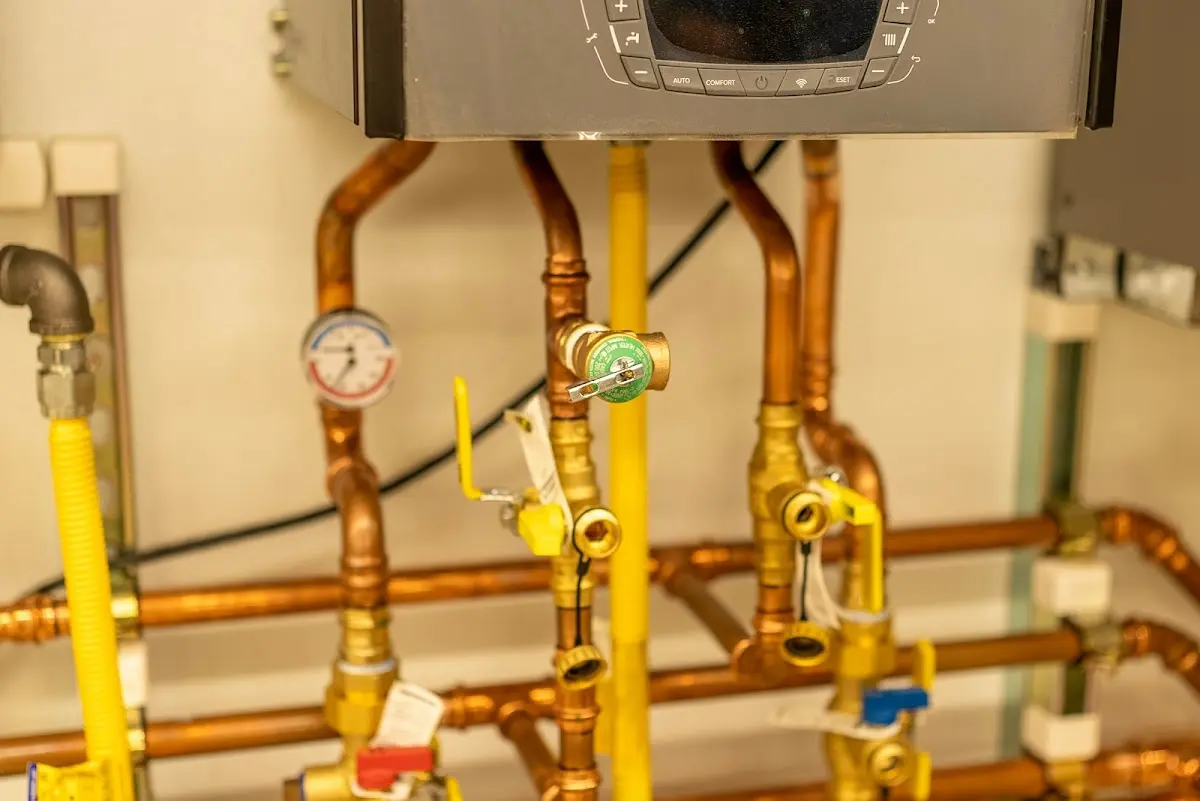 Licensed technician providing Backflow Prevention for a homeowner in Elgin